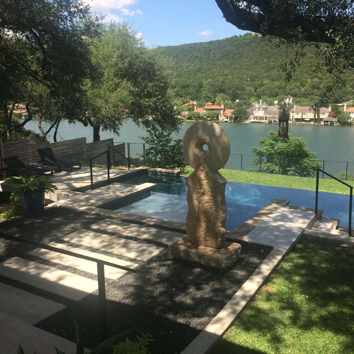 A logistically challenging installation for which Elise identified creative solutions: Roger Foster, Defining The View Series XLVI Stone Ocular #15, Texas limestone, 84” x 37” x 24”
