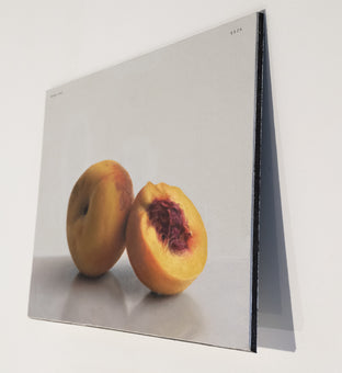 Peach and a Half by Daniel Caro |  Side View of Artwork 