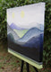 Original art for sale at UGallery.com | Moons over Mountains by Brit J Oie | $850 | mixed media artwork | 20' h x 24' w | thumbnail 2