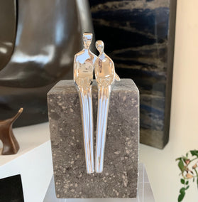 sculpture by Yenny Cocq titled Close to Me in Silver Plate