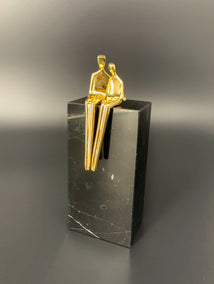 sculpture by Yenny Cocq titled Gold - Close to Me